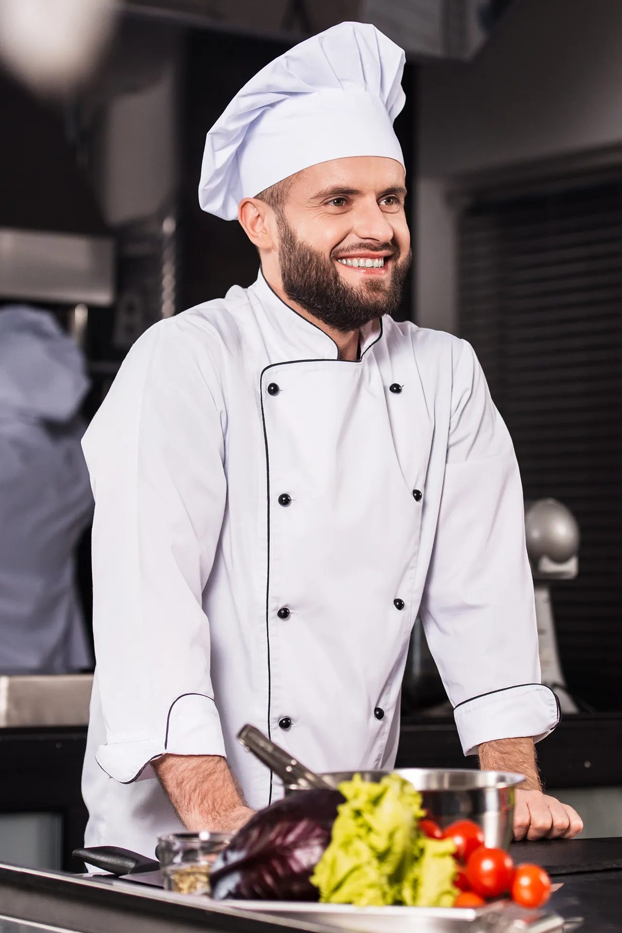 KOS male chef in white chef hat
